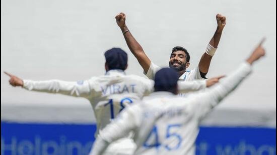 Virat Kohli and Rohit Sharma celebrate as Jasprit Bumrah celebrates the dismissal of Australia's Travis Head at the Melbourne Cricket Ground on December 29, 2024. (AP Photo) Virat Kohli and Rohit Sharma celebrate as Jasprit Bumrah celebrates the dismissal of Australia's Travis Head at the Melbourne Cricket Ground on December 29, 2024. (AP Photo)