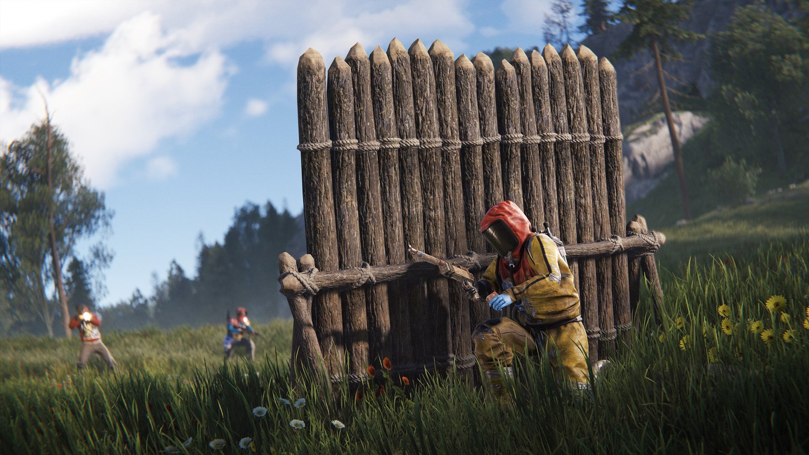 Rust June update - A player hides behind a wooden barricade in PvP.