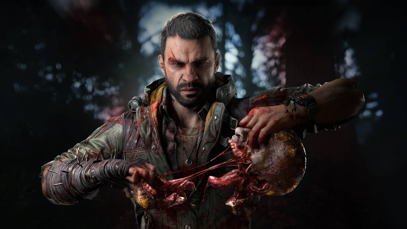 A man with a bloodied face grimaces into the camera pulling apart a zombie skull by the jaw in his hands
