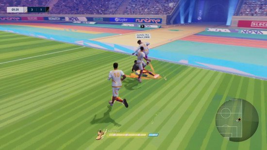 Rematch-tips-1 A player slide tackling in Rematch.