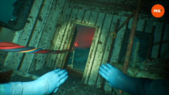 still-wakes-the-deep-dlc-review-exploration Still Wakes the Deep DLC review: Mhairi cuts through the water towards an open door as the umbilical stretches out in front of her.