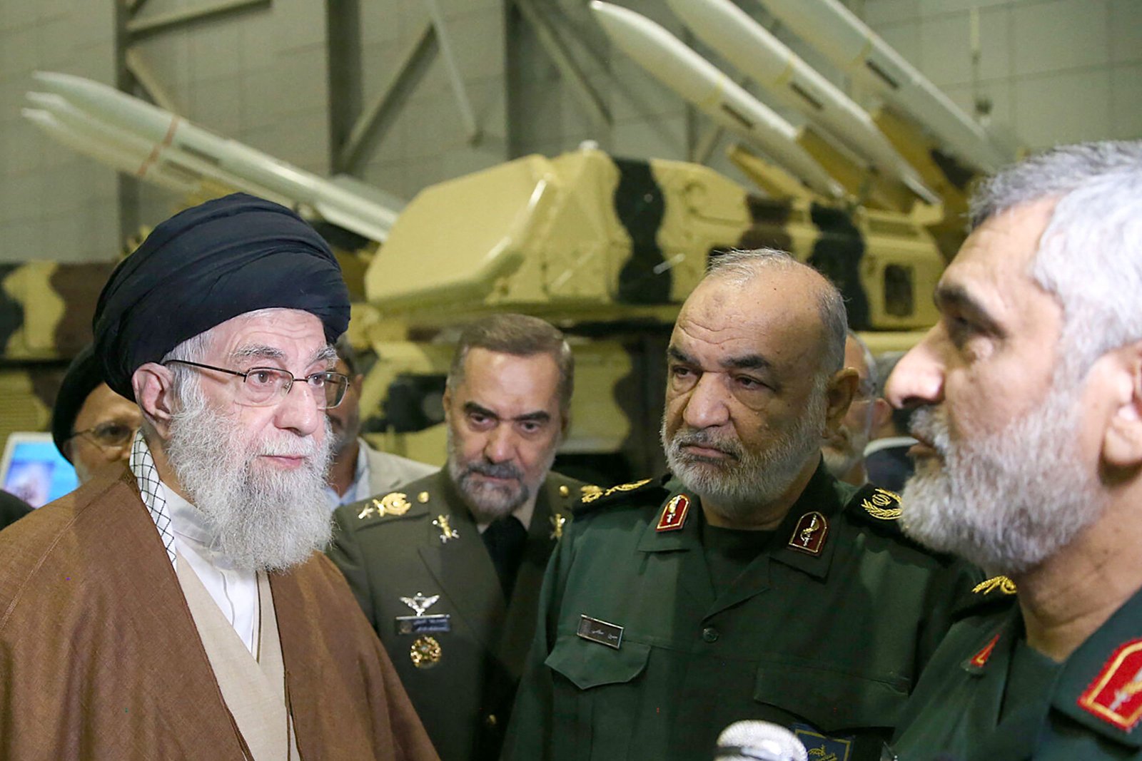 (FILES) This handout file picture obtained from the office of Iran's Supreme Leader Ayatollah Ali Khamenei shows him (L), Hossein Salami (2nd R), head of Iran's Islamic Revolutionary Guard Corps (IRGC), and General Amir Ali Hajizadeh, the head of the corps' aerospace division (R)(AFP) (FILES) This handout file picture obtained from the office of Iran's Supreme Leader Ayatollah Ali Khamenei shows him (L), Hossein Salami (2nd R), head of Iran's Islamic Revolutionary Guard Corps (IRGC), and General Amir Ali Hajizadeh, the head of the corps' aerospace division (R)(AFP)
