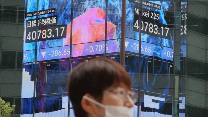 Japan-Financial-Markets_1760489367859_1760489368115.jpg