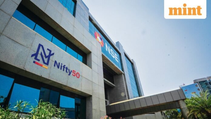 nnifty_50_hits_record_high_1763714217578_1763714217792.jpg